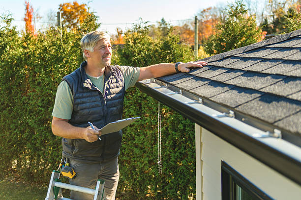 Professional Roofing technician working in Northwood, ND